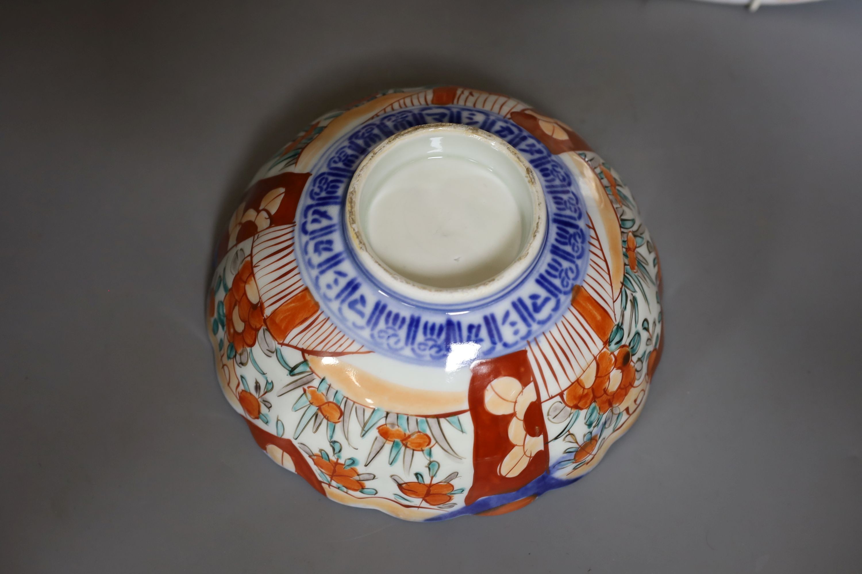 Two Imari dishes, largest 45cm., and an Imari bowl